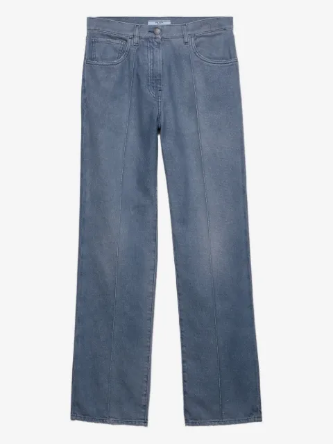 Prada jean délavé à patch logo