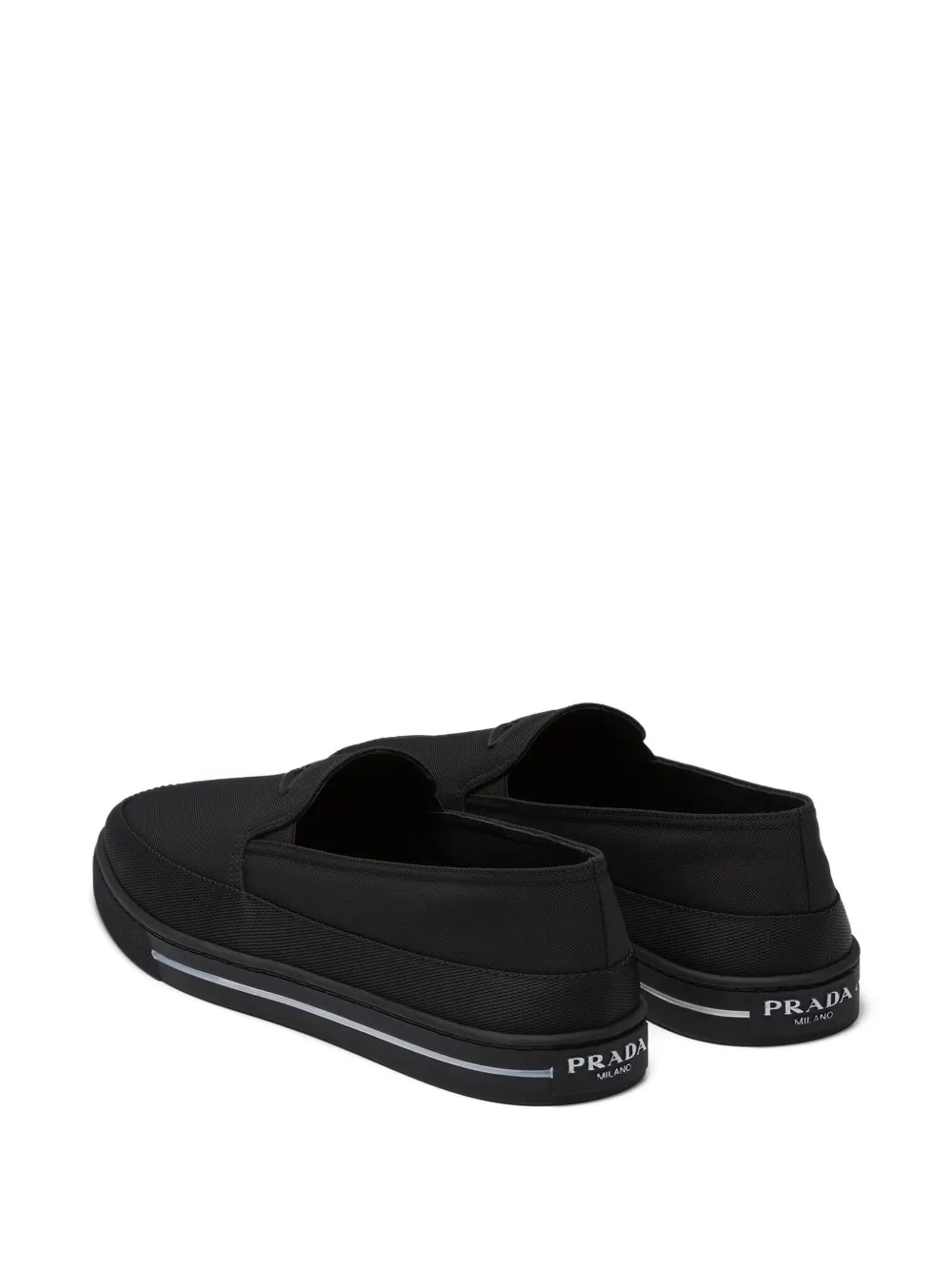 Prada Re-nylon Embossed Logo Slip-on Trainers In Black