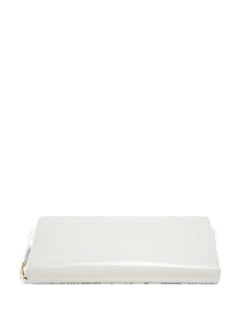 Comme Des Garçons Wallet cartera de piel con cierre en el contorno