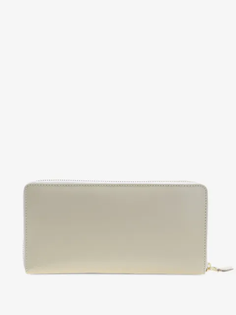 Comme Des Garçons Wallet cartera de piel con cierre en el contorno