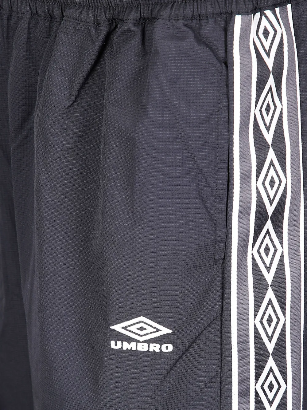 UMBRO Broek met elastische tailleband en zijstrepen Zwart