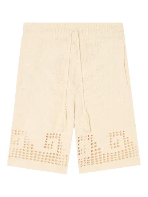 Alanui Where The Wave Begins shorts med hålmönster och tofsar