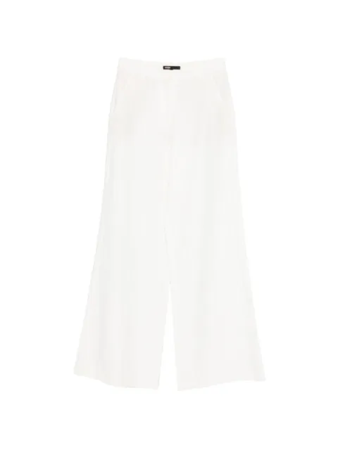 Maje pantalones con estampado de rayas diplomáticas