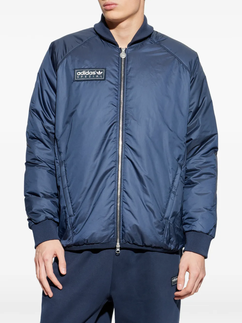 adidas Bramhope SPZL logo-patch jacket Blauw