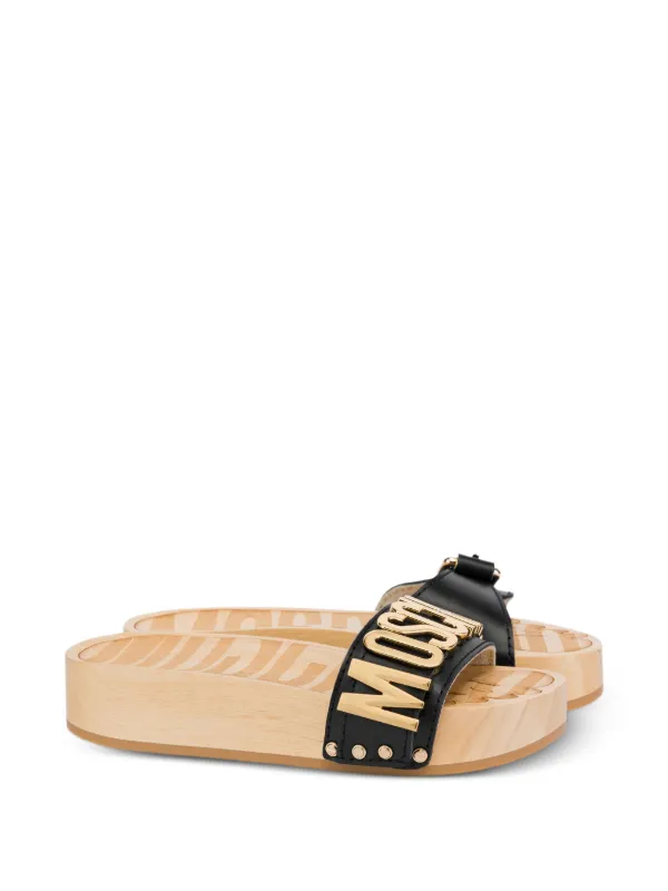 Moschino ロゴ ミュール | ブラック | FARFETCH JP