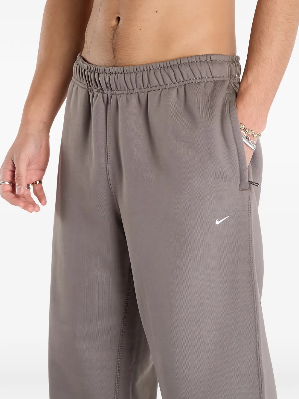 Nike Solo Swoosh track pants Grijs