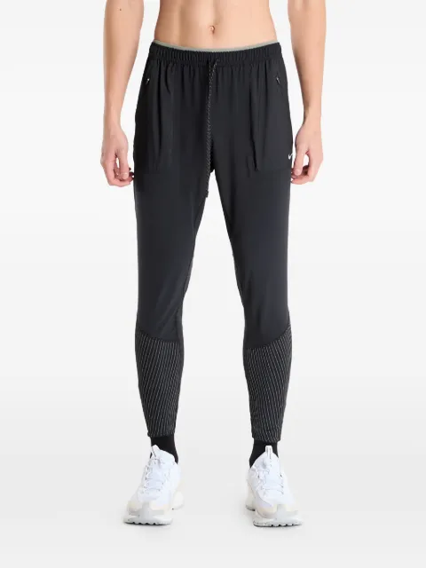Nike reflective accents running track pants