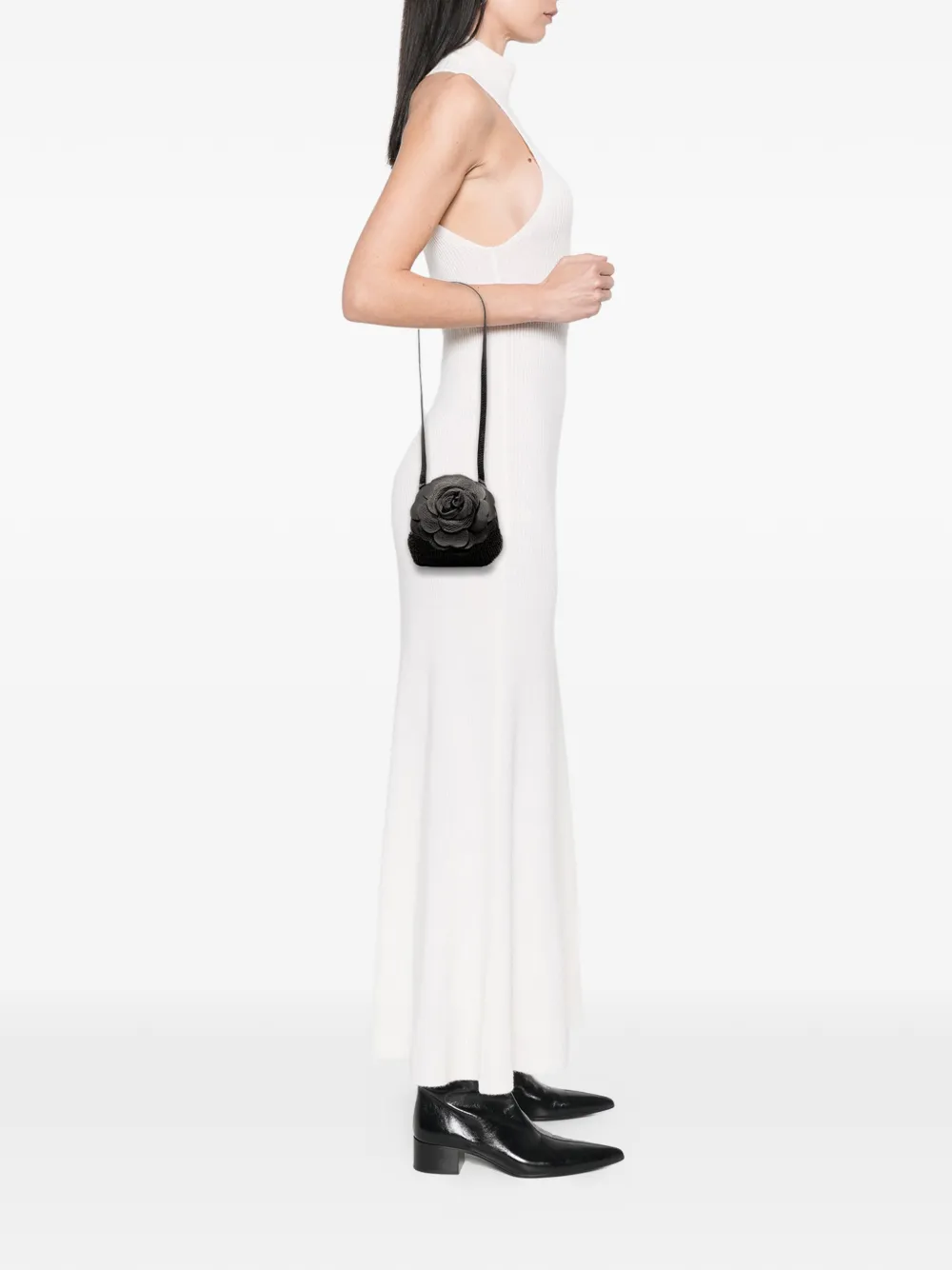 Click to view more detailed imagery on our partner's website Pre-owned Bottega Veneta 20th Century Woven Leather Floral Shoulder Bag In Black