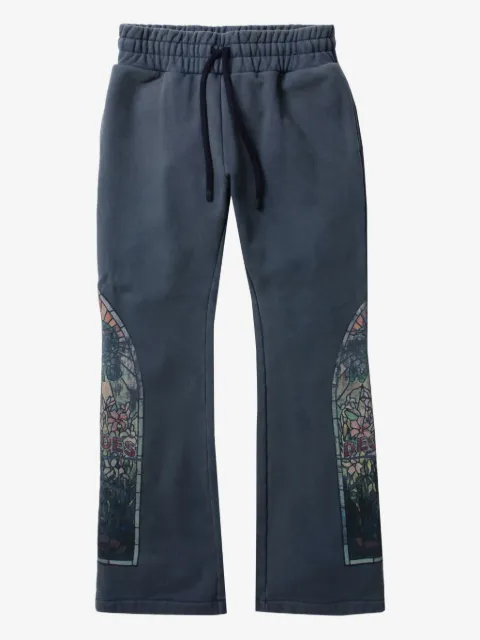 Who Decides War printed track pants
