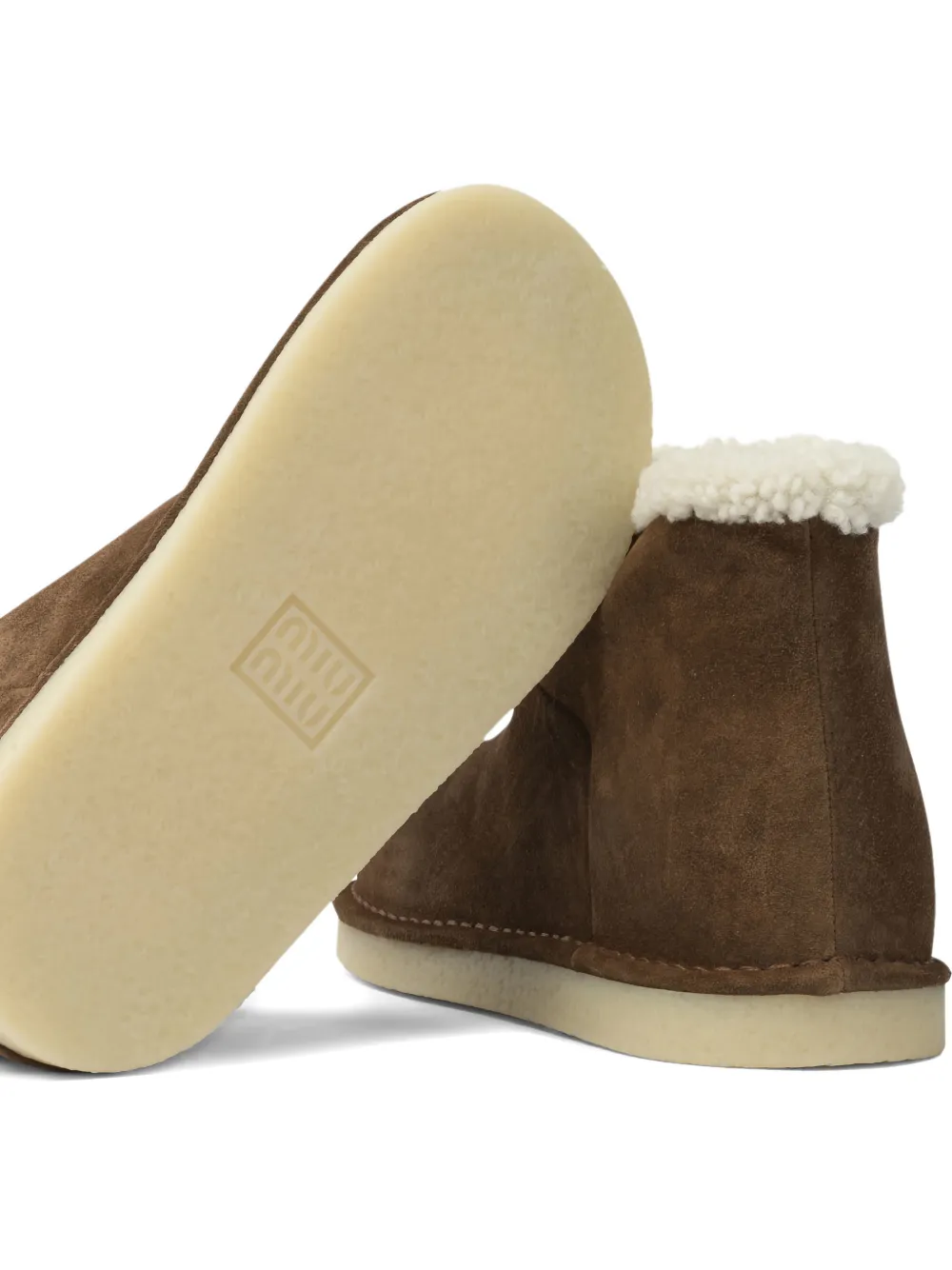 Miu logo-detail shearling boots Bruin