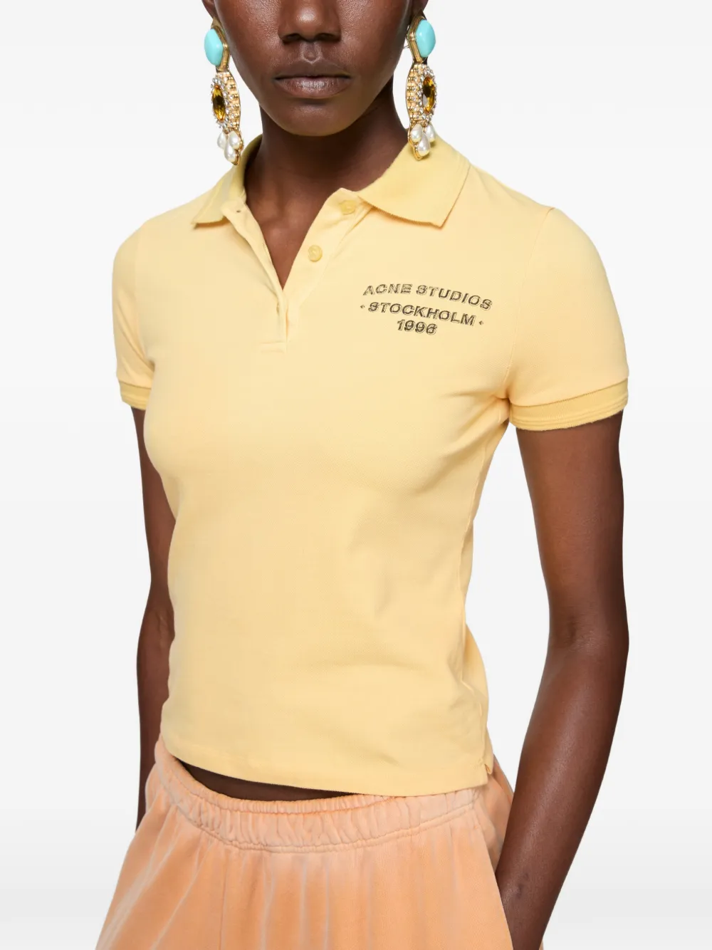Acne Studios Poloshirt met knopen en logo Geel