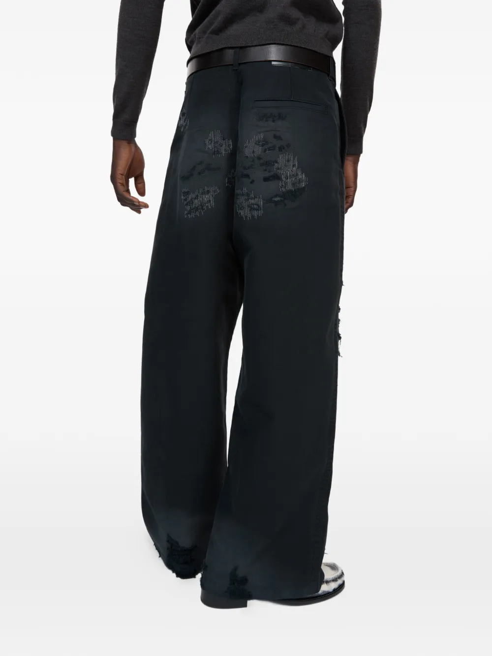 Acne Studios Mended gerafelde broek Zwart