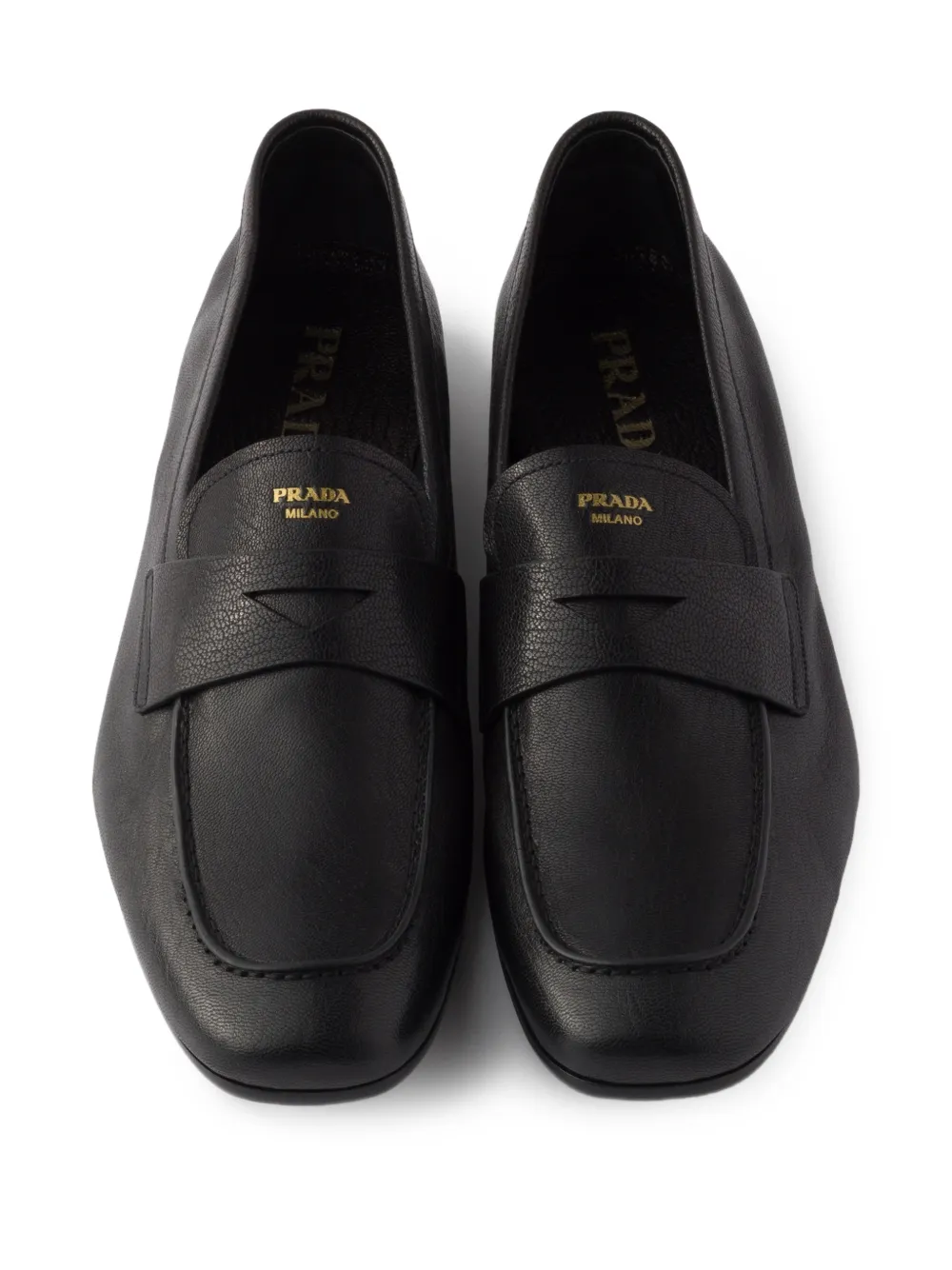 Prada Leren loafers met logoband Zwart