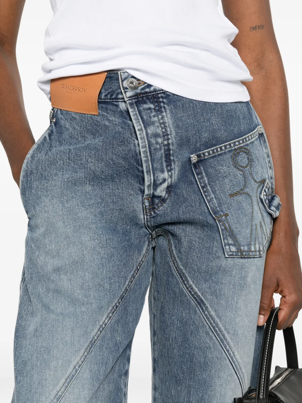 JW Anderson Jeans met gedraaid effect en logopatch Blauw