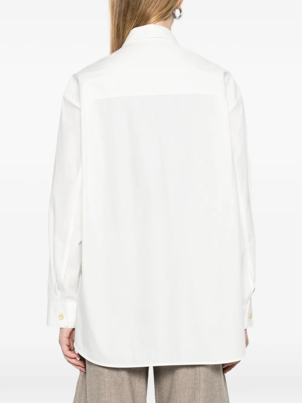 KHAITE Goya blouse met knoop Wit