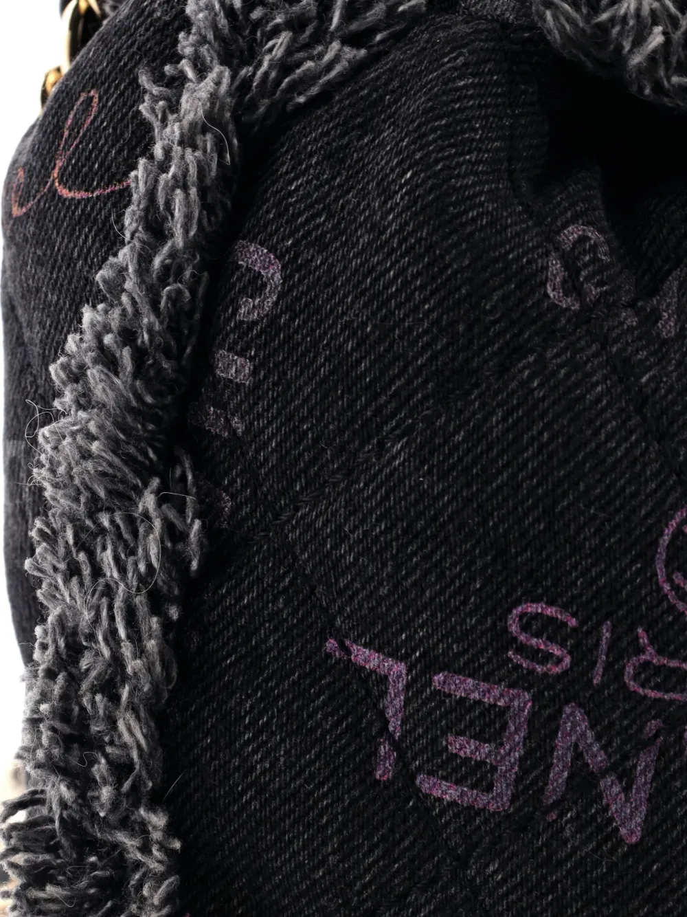 CHANEL Pre-owned Denim Mood Chain Logo Printed Quilted Fringe Denim Medium Bucket Bag In Black