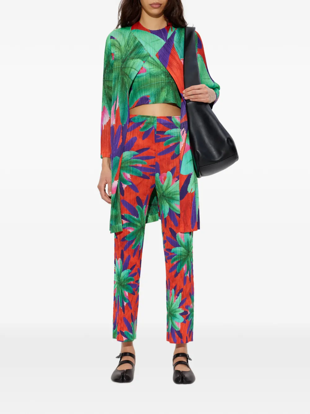 Pleats Please Issey Miyake pleated floral-print trousers - Rood