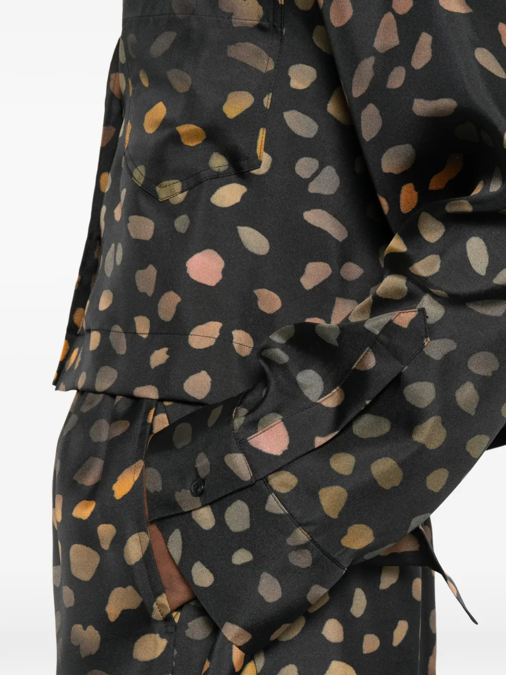 Nanushka Cropped blouse met gestrikte manchetten Zwart