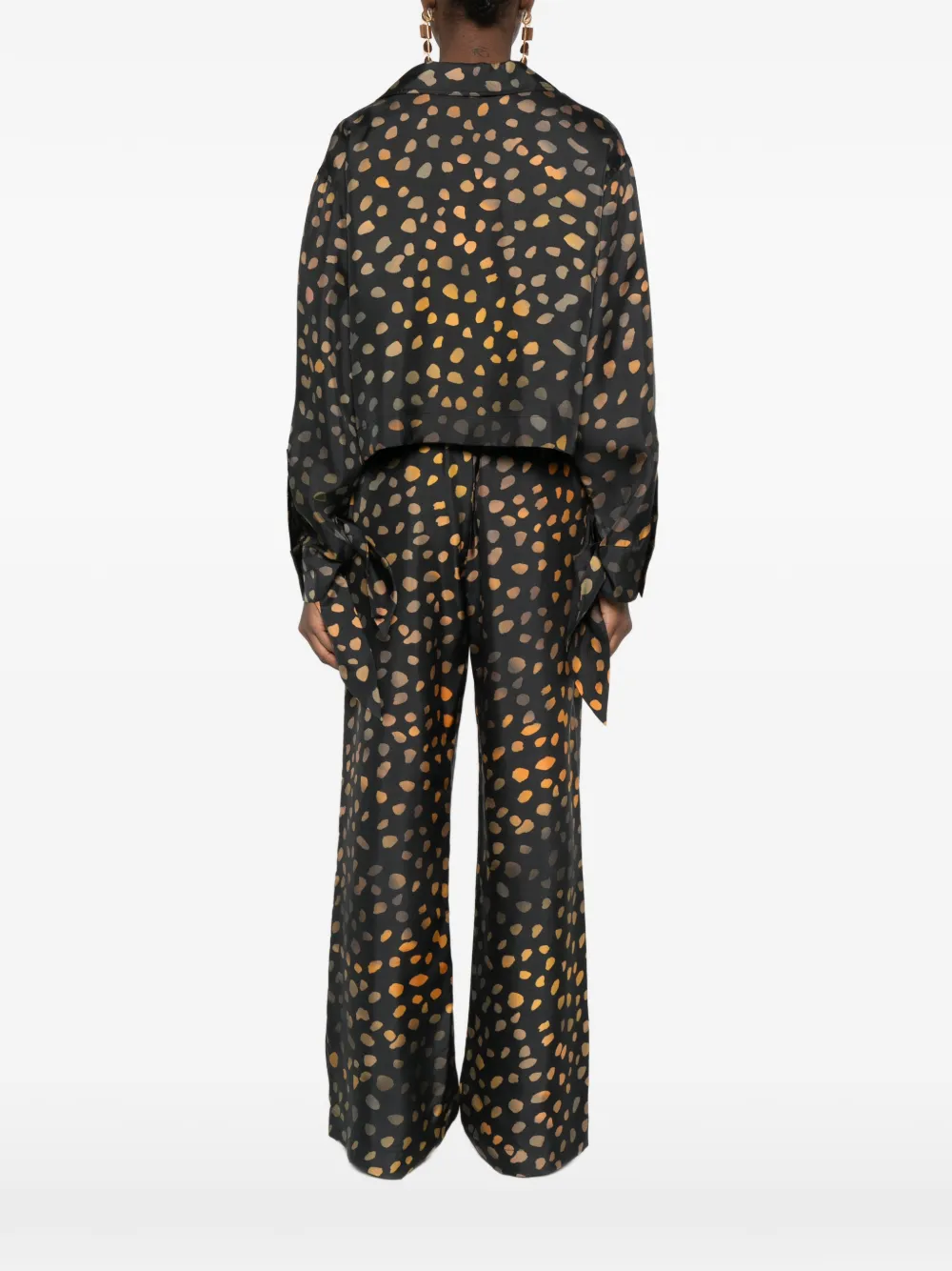 Nanushka Cropped blouse met gestrikte manchetten Zwart