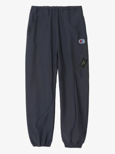 Undercover pants con parche del logo de N.HOOLYWOOD x Champion