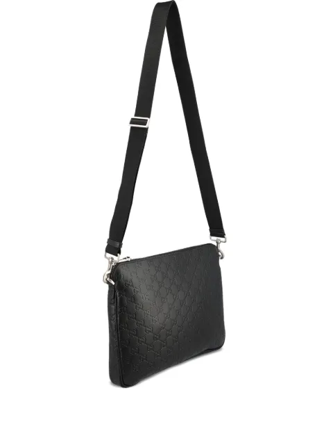 Gucci medium GG Emblem embossed clutch bag