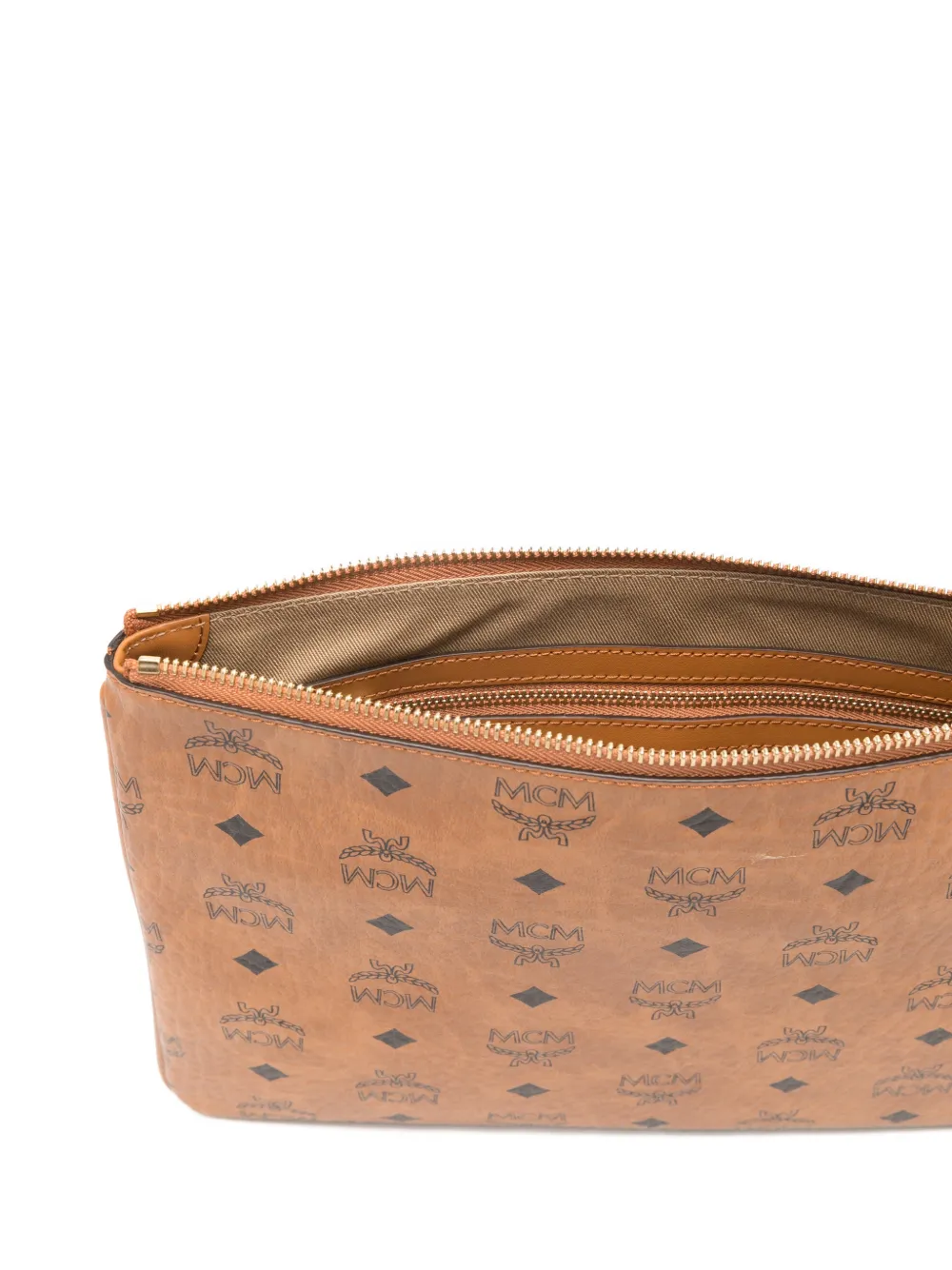 Mcm Logo-pattern Clutch Bag In Brown