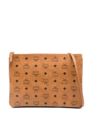 MCM Tracy モノグラム クラッチバッグ | ブラウン | FARFETCH JP