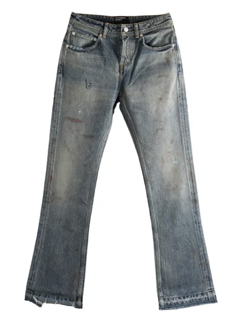 Enfants Riches Déprimés logo-patch distressed denim jeans