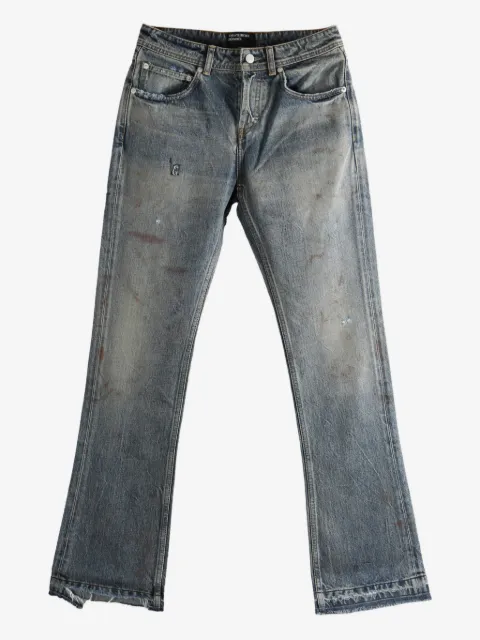 Enfants Riches Déprimés logo-patch distressed denim jeans