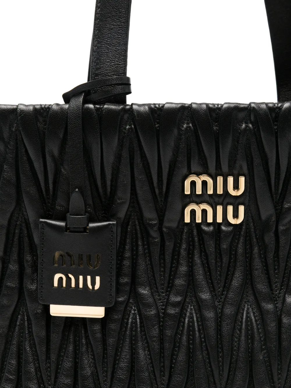 Miu Miu レザートートバッグ ブラック ステッチロゴ Miu Miu Pre-Owned レザー トートバッグ | ブラック | FARFETCH JP