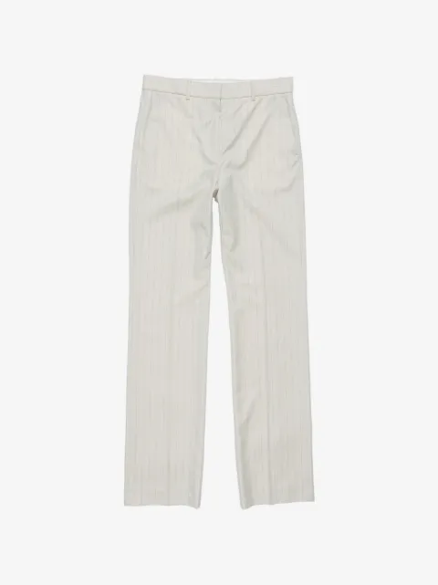 Acne Studios pantalones con estampado de rayas diplomáticas