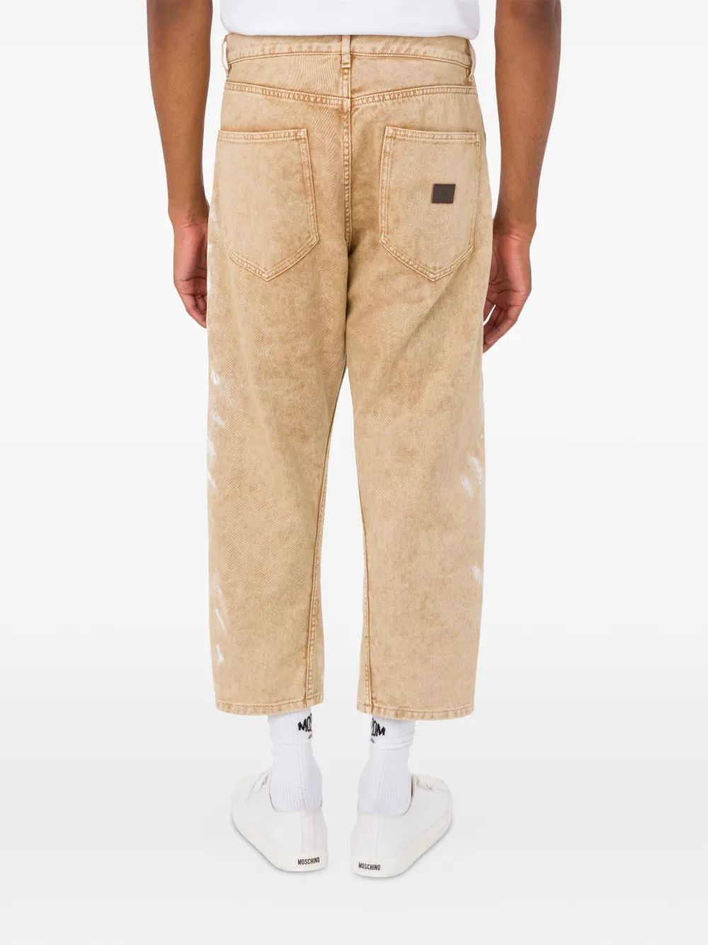 Moschino Bootcut jeans met verfspatten Beige