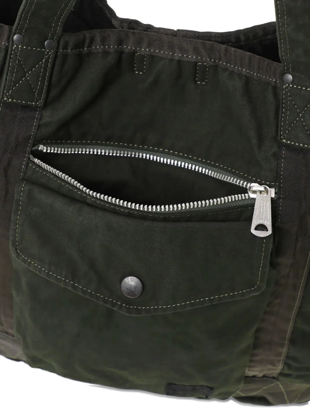 Porter-Yoshida & Co. Shopper met ritszak Groen