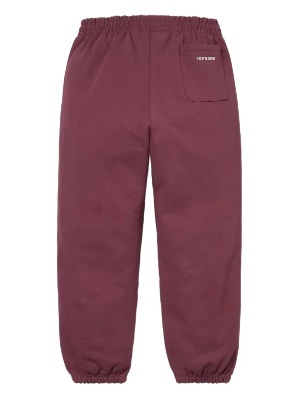 Supreme トラックパンツ | レッド | FARFETCH JP