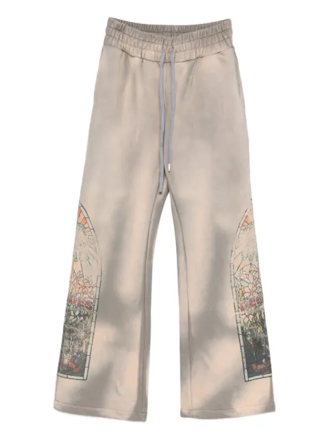 Who Decides War graphic-print track pants