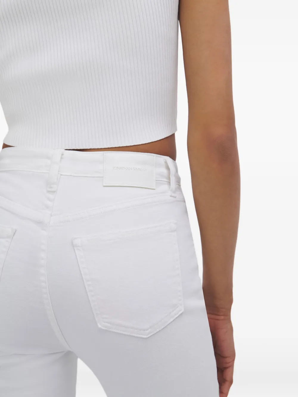 SIMKHAI River straight jeans met franje afwerking Wit