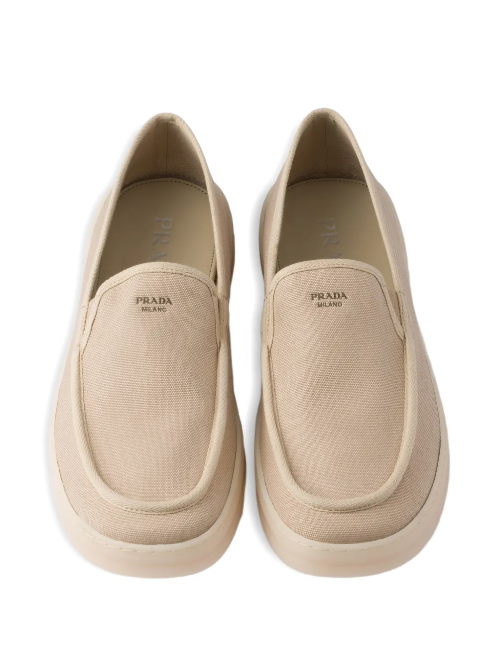 Prada Loafers met logoprint Beige