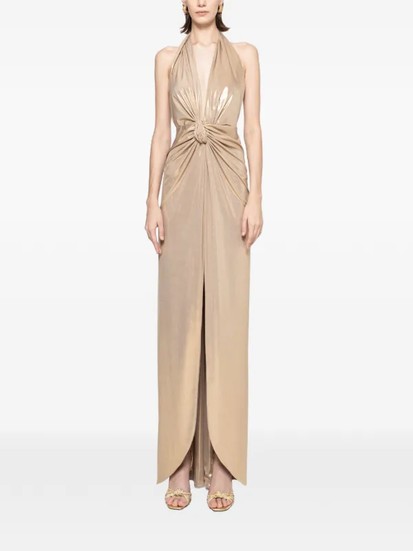 gold lame dress Liquid lam is draped with a plunging V neckline and a fluid cape back in this mesmerizing dress, designed to reveal its full impact in motion neckline and cinches at the waist before falling to a maxi hem Gunne Sax Gold Lam Gown