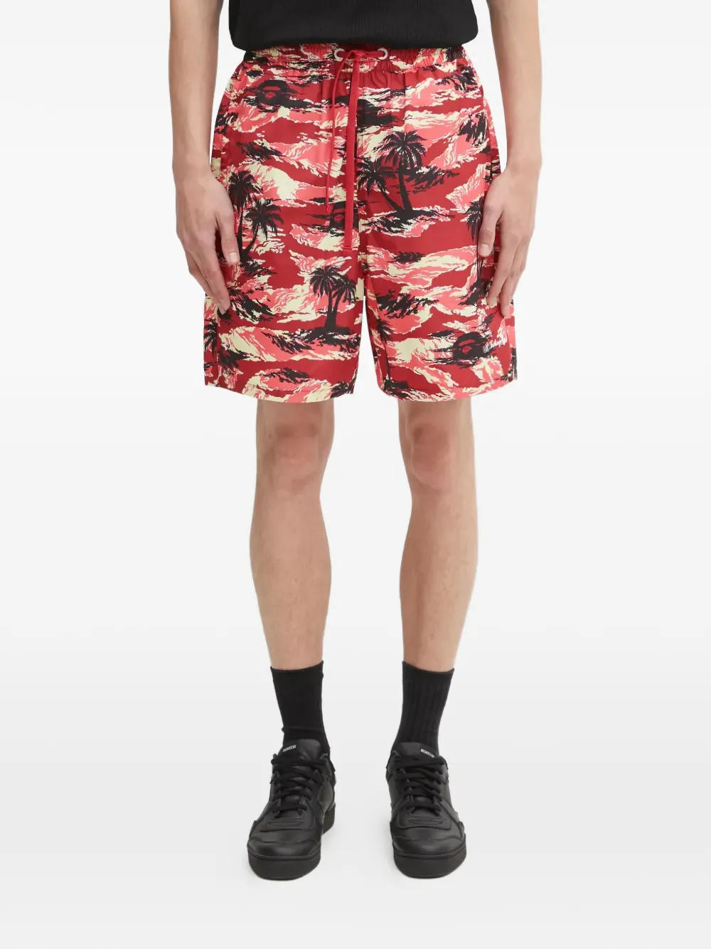 A BATHING APE® palm-tree printed shorts | Red | Image 1