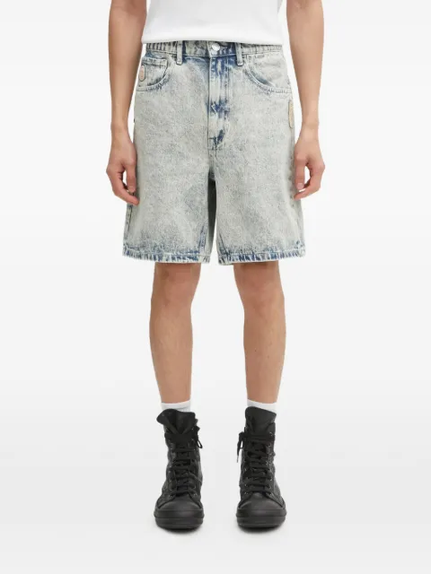 AAPE BY *A BATHING APE® short en jean à patch logo