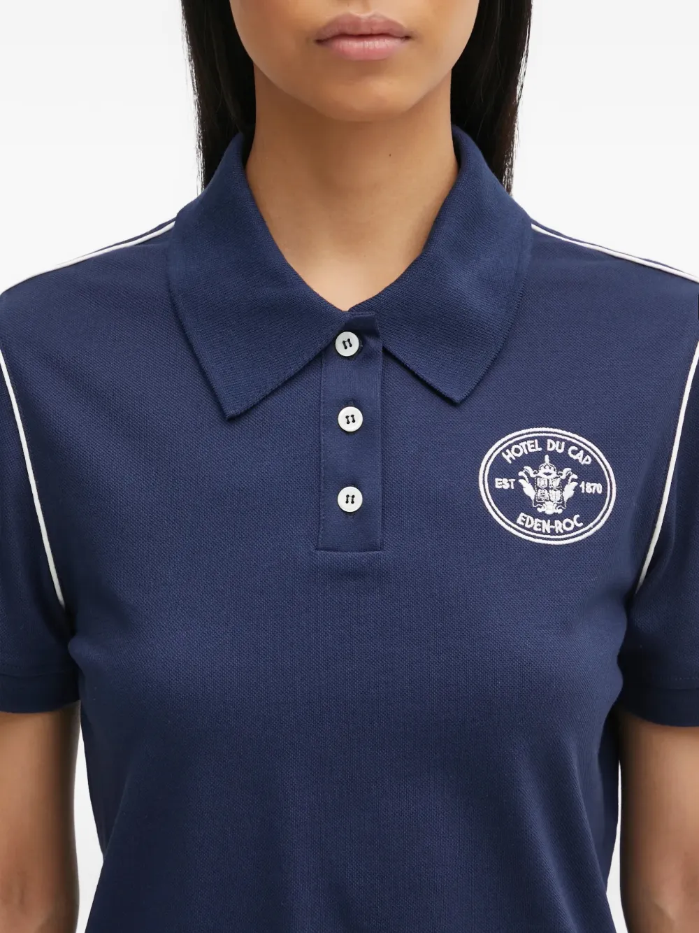 Sporty & Rich Hotel Eden Roc poloshirt met logo en korte mouwen Blauw