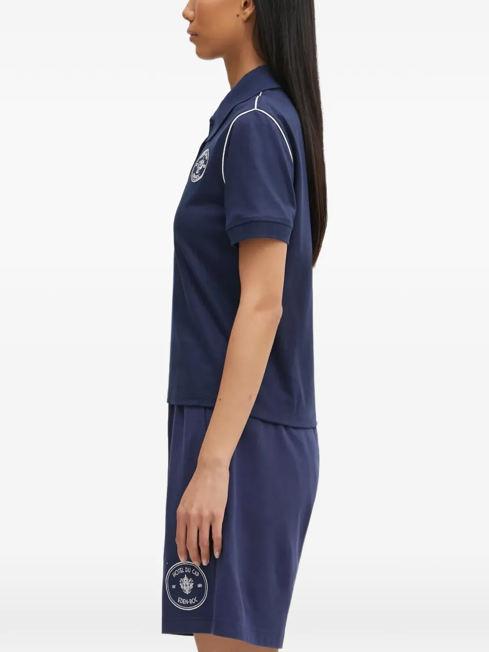 Sporty & Rich Hotel Eden Roc poloshirt met logo en korte mouwen Blauw