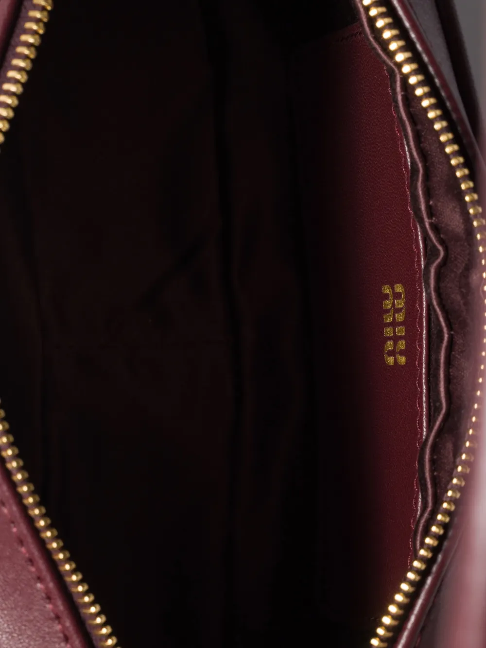 Miu Leren clutch met verstelbare band Rood