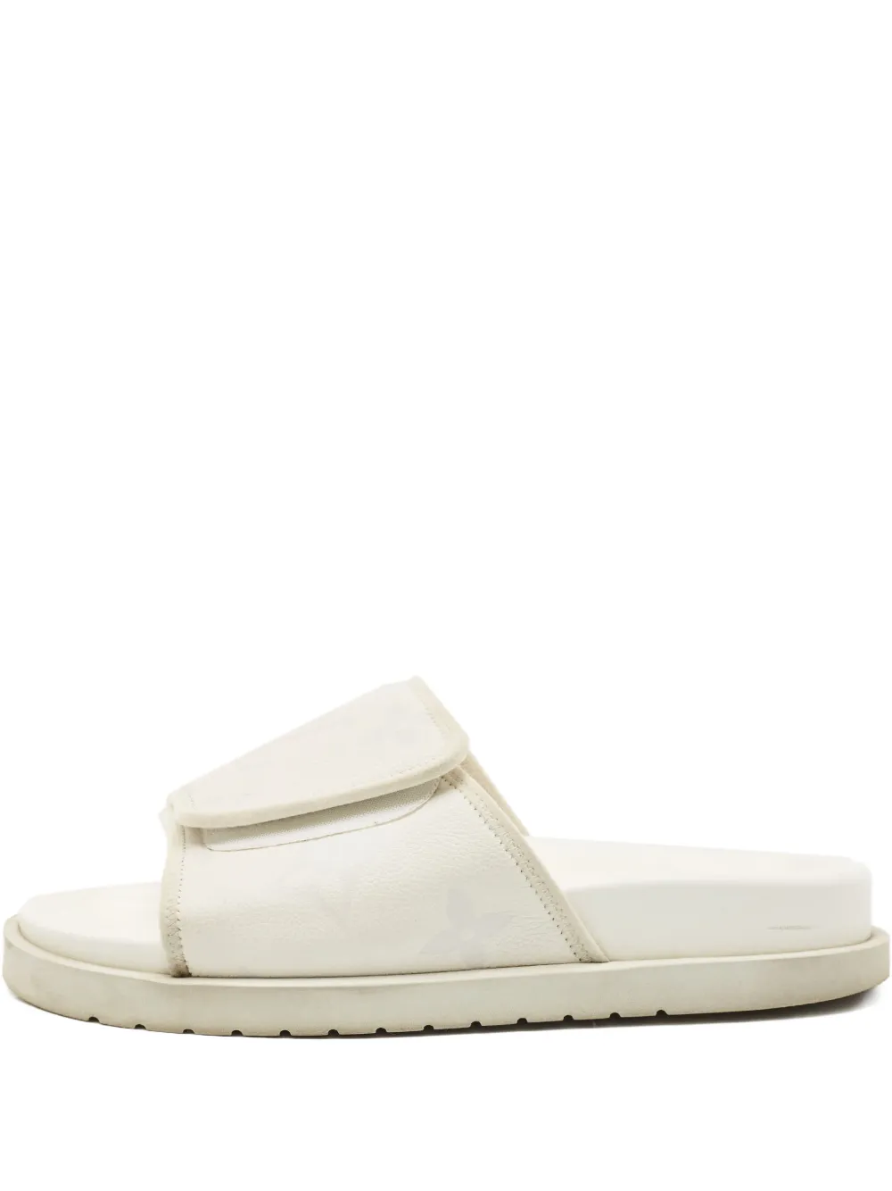 Louis Vuitton Pre-Owned monogram flat slides | Neutrals | Image 1