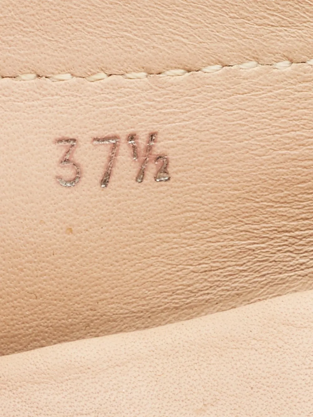 Tod's Vintage Gommino embossed leather loafers Beige