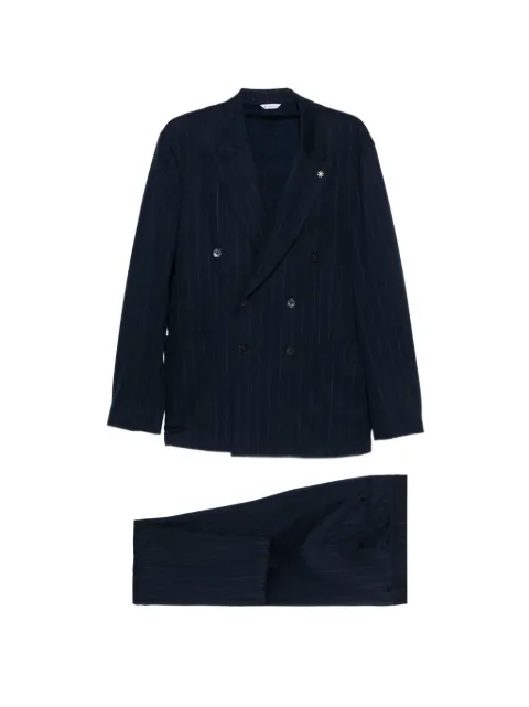 Manuel Ritz traje con rayas estampadas y con doble botonadura