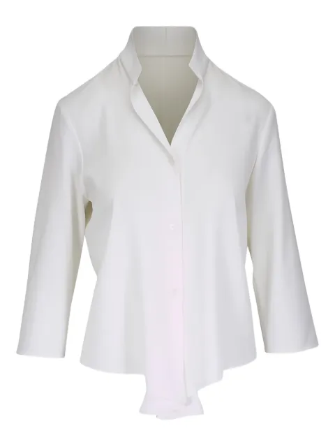 Peter Cohen white blouse