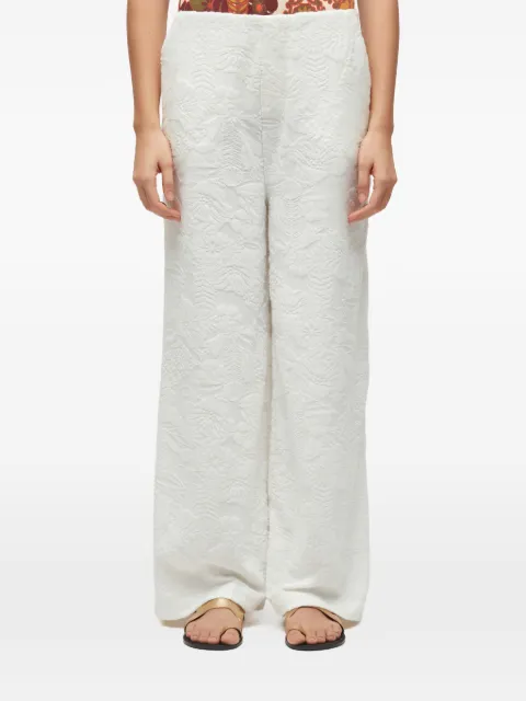 Osklen pantalones acampanados con motivo floral en jacquard