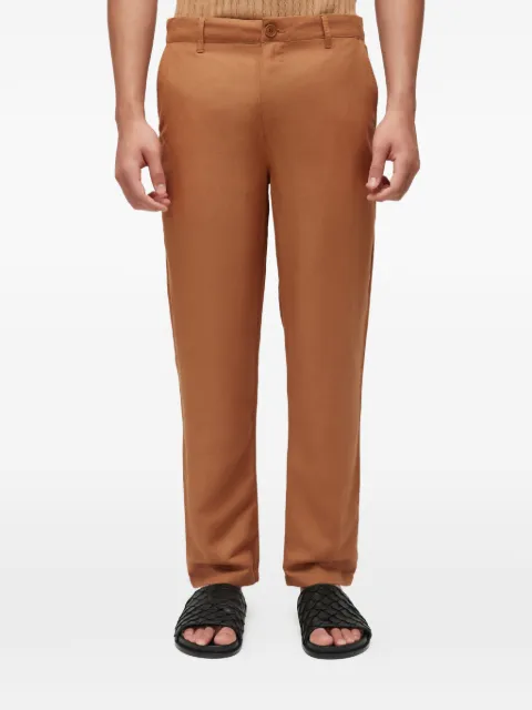 Osklen pantalones con trabillas