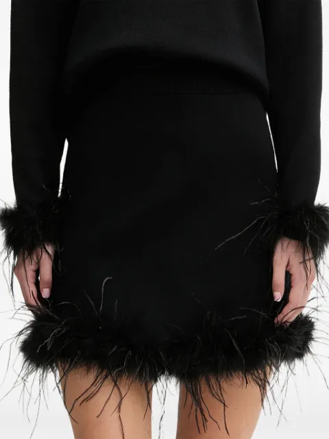 NEVER FULLY DRESSED falda con ribete de pluma
